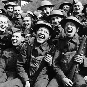 British troops in Sussex have a laugh as they are entertained by members of ENSA during