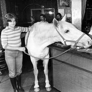 Deborah Carter, 17 can take her white horse anywhere. She takes Kelly into the bar of