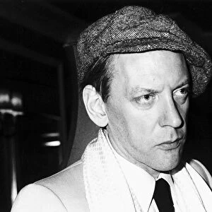 Donald Sutherland in cloth cap at a party in Londons White elephant club