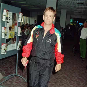 Elton John at Heathrow Airport. 19th September 1993