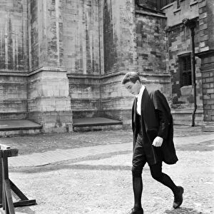 Eton Celebrations. The Etonian hurrying across the Cloisters at Eton College this weekend