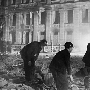 Fireman at Cheapside, centre of London, during another night of air raids from the German