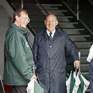 Former Formula One racing driver Sterling Moss (right). Moss was driving a C-Type