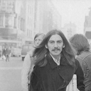 George Harrison in Birmingham City Centre before performing at the Town Hall