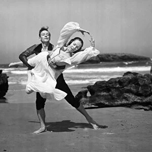 George Skibine and Maria Tallchief, Ballet Dancers performing routine on the beach at