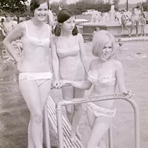 Girls in bikinis enjoying the hot summer at Ryton open-air swimming pool, Coventry