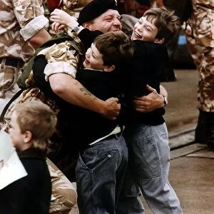 Gulf War reunion A soldier is met by his two children returning from Gulf War