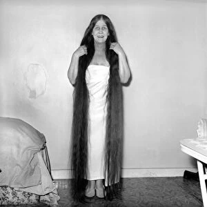 Hair styles: Long hair: Mrs. Mabel Anderson seen here with her floor length hair