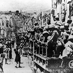 Hysterical cheers greet U.s Troops en route for Palermo
