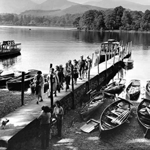 Lake District - Derwentwater - Holidaymakers disembark at Keswick after a cruise