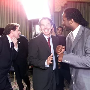 Lennox Lewis boxer with Tony Blair Prime Minister May 1999 at the Mirror Pride of