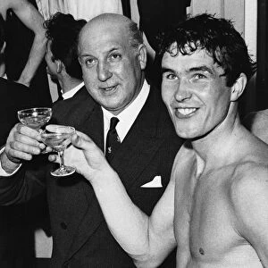 Liverpool captain Ron Yeats and Chairman My Sydney Reakes celebrate with a glass of
