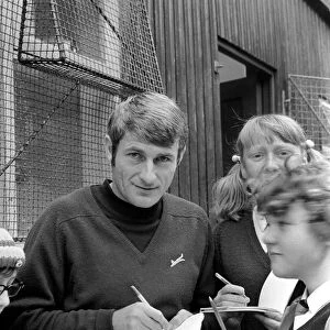 Liverpool player Roger Hunt signing autographs for fans. November 1969 Z10571