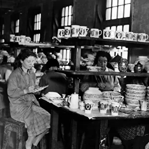 Maling pottery works, women applying transfers ahead of forthcoming royal coronation of
