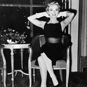 Marilyn Monroe hands behind head gloves MSI 15th July 1956