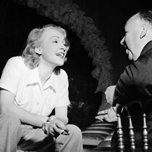 Marlene Deitrich talks to Alfred Hitchcock film director 1949