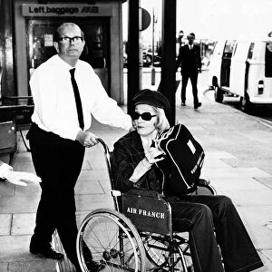 Marlene Dietrich Actress Leaves london airport in a wheelchair Dbase MSI