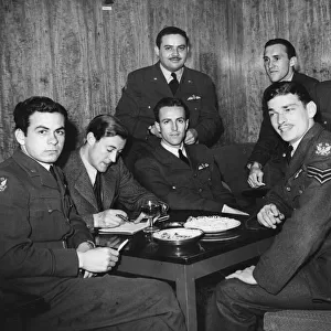 Members of an American Eagle Squadron at an overseas Club Place challenge during