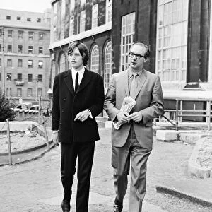 Mick Jagger of The Rolling Stones with his lawyer Mr Dale Parkinson after receiving a