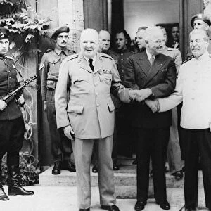 Mr Churchill, President Truman and Generalissimo Stalin linking hands outside the Prime