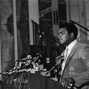 Muhammad Ali speaking at a press conference ahead of his upcoming fight against World