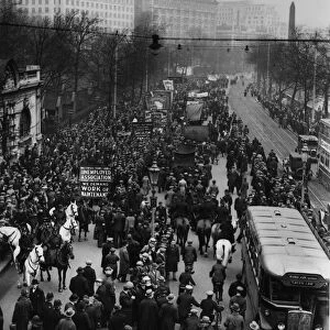 A National Unemployment demonstration showing the procession moving along the Embankment