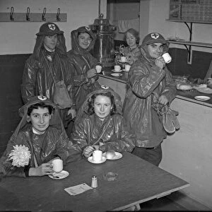 A nice cup of tea. Ambulance drivers have a cup of tea at a canteen for A. R. P