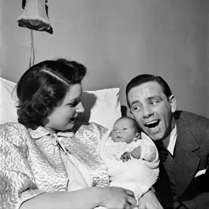 Norman Wisdom with baby son Nicholas. March 1953 D1491