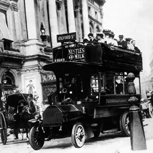 The Omnibus with passengers onboard - September 1909 heading for Oxford Street