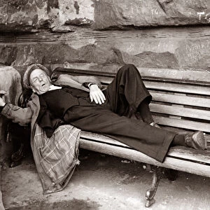 Pensioner takes a nap on a park bench Sleeping old people Senior gentleman