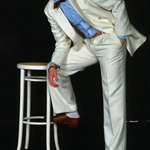 Peter Capaldi modelling white suit May 1983