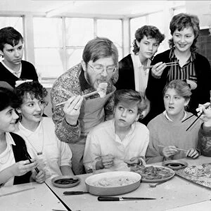 Picture shows teacher Bernard O Connor cooking Chinese dumplings forces pupils