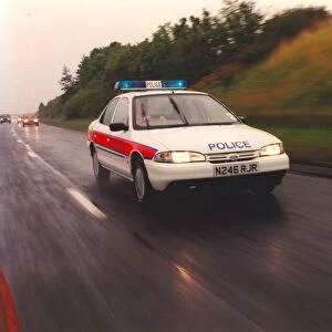 A police officer drives a new rapid response patrol car