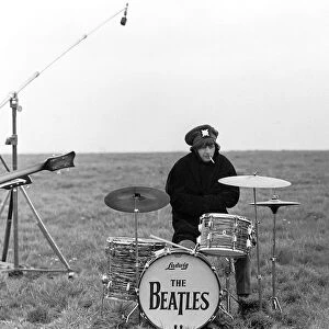 Pop Group The Beatles May 1965 Ringo Starr on drums during filming of "