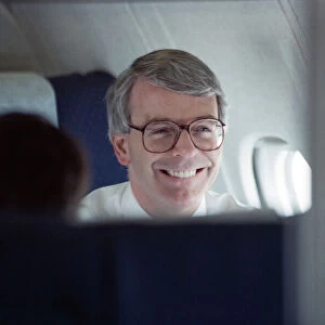 Prime Minister John Major pictured on an aeroplane. 17th March 1992