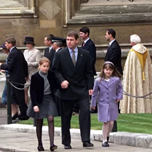 Prince Andrew with Princess Beatrice and Eugenie after attending a Easter Sunday service