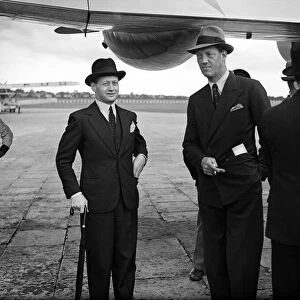 Prince Axel of Denmark (centre) on a official visit dis-embarks from Danish Air Lines