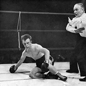 Referee signals the fight is over for Tony Barlow at the end of his fight against John