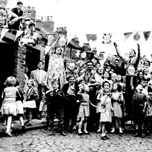 Residents of Hawes Street, Byker, prepare to celebrate the Queens Coronation