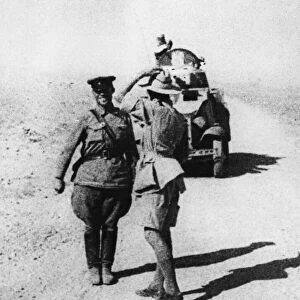 On the road over one of the desert son Iran a British Colonial officers of the Read Army