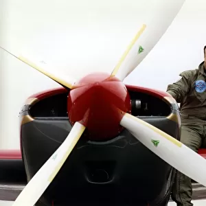 Royal Jordanian Falcons pilot Captain Tayseer Daboubi takes a break with his Extra EA300
