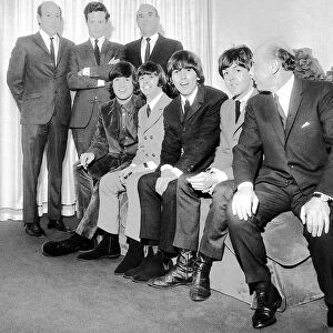 (Standing from L-R): Dick Lester, record producer Brian Epstein (centre