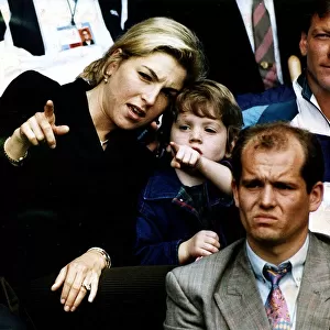 Tatum O Neal Actress wife of Tennis star John McEnroe with her son Kevin watching him