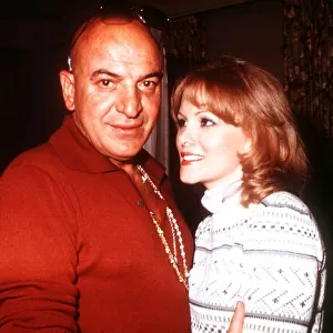 Telly Savalas the actor from Kojak with his girlfriend Marce Hamsen February