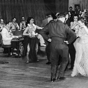 A thanksgiving celebration at The Queensbury Club, Soho, London, after war is over