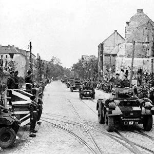 Troops of the 7th Armoured Division led by the 11th Hussars enter the city of Berlin