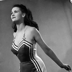 Woman wearing one piece swimsuit April 1952 P017651