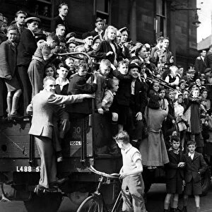 World War two victory parade - Geordie sightseers crowd aboard lorries to get a good view