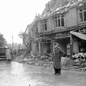 WW2 Air Raid Damage Air raid damage at Bridlington A woman stands in