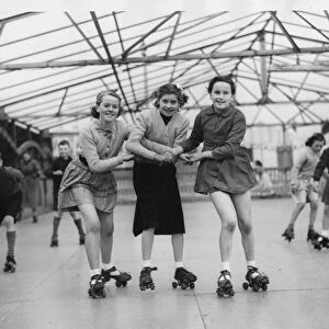 Three young roller skaters on the open air skating rink at Seaburn, l to r, May Harker